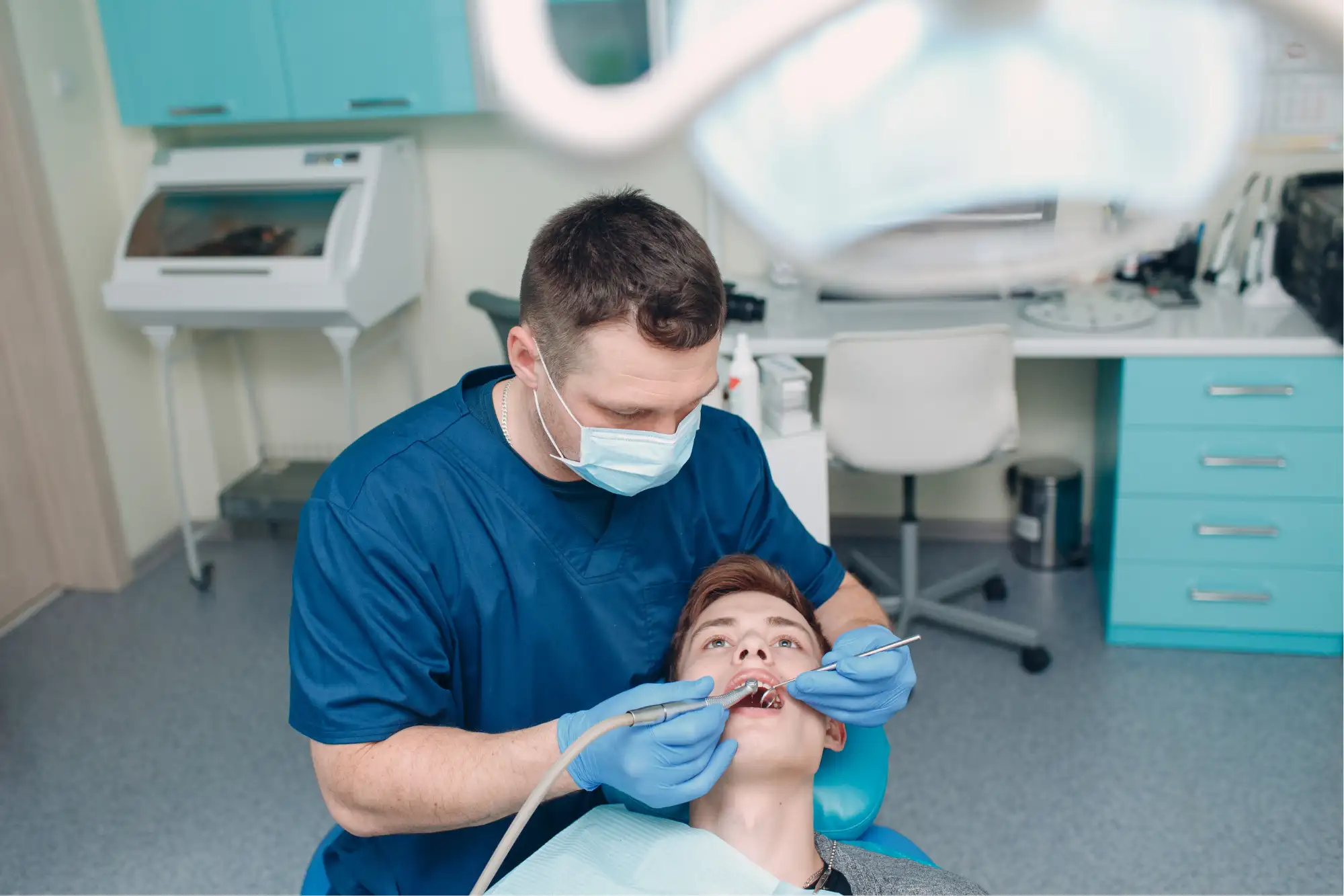 Person at the dentist to show where to get dental bridge near rexburg