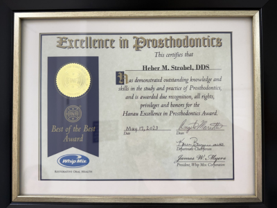 Hanau Best of the Best Excellence in Prosthodontics Award certificate presented to Heber M. Strobel, DDS on May 17, 2023 as the Louisiana State University School of Dentistry nominee, signed by the dean and by the president of Whip Mix Corporation. Caption: Hanau Best of the Best Excellence in Prosthodontics Award, LSU School of Dentistry nominee, May 17, 2023. Issued by Whip Mix Corporation.